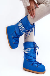 Astrella High Platform Snow Boots in blue with eco leather and bold lettering, featuring dual lacing and thick platform for grip.