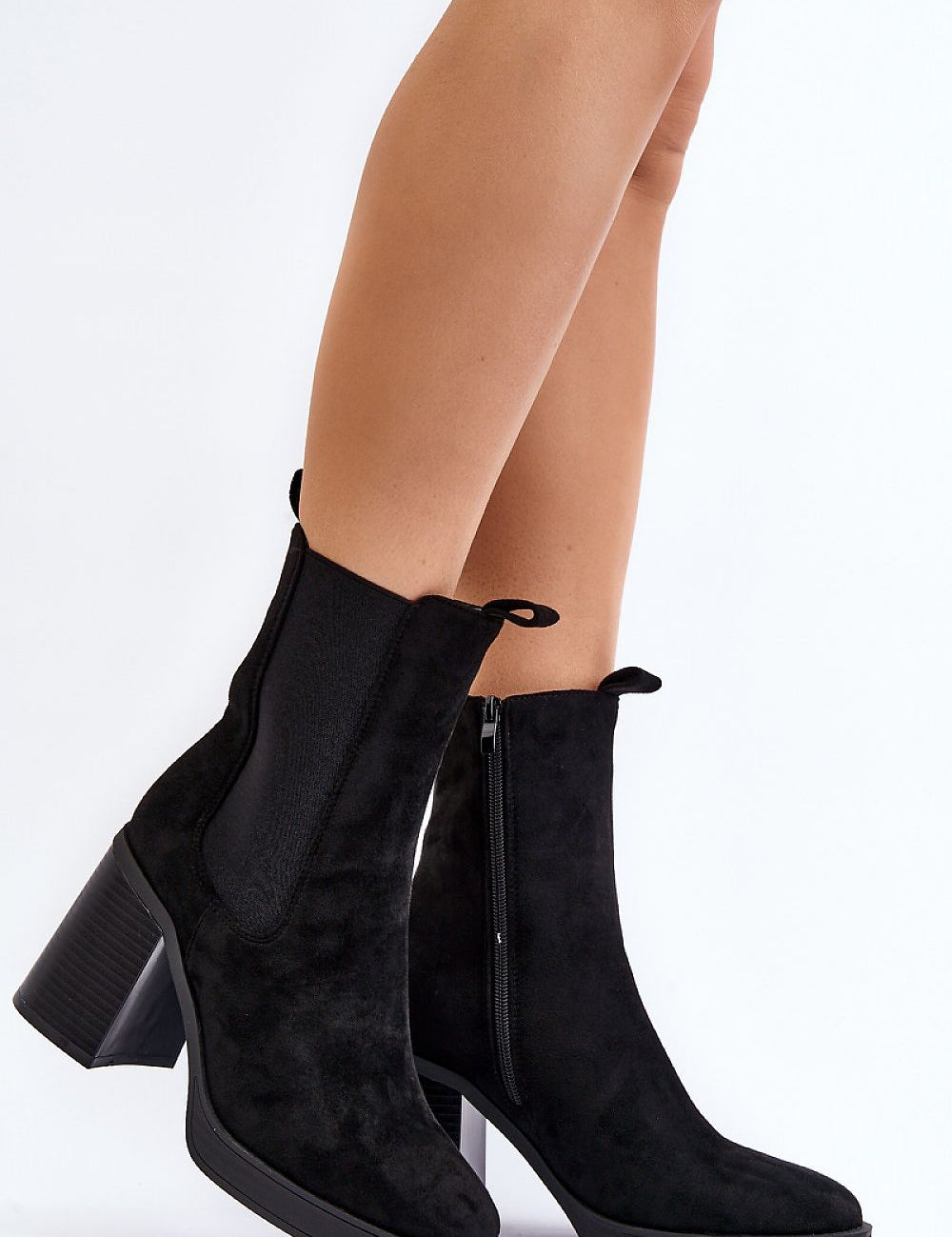 Black Ardelia Suede Platform Heel Boots with side zipper and block heel, showcasing eco-friendly design and versatile styling for any occasion.
