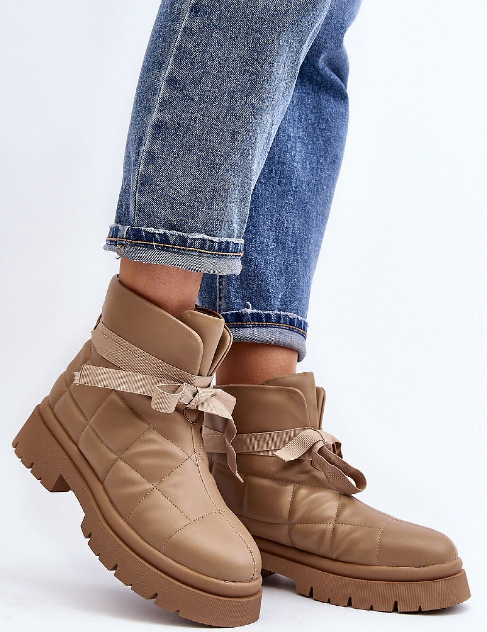 Velda Quilted Slip-On Winter Boots with eco leather and fur-like lining, flat heel and platform, providing comfort and warmth for winter.