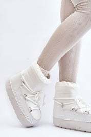 Women's white platform snow boots with laces, featuring a cozy, plush interior and eco-leather exterior for winter protection.