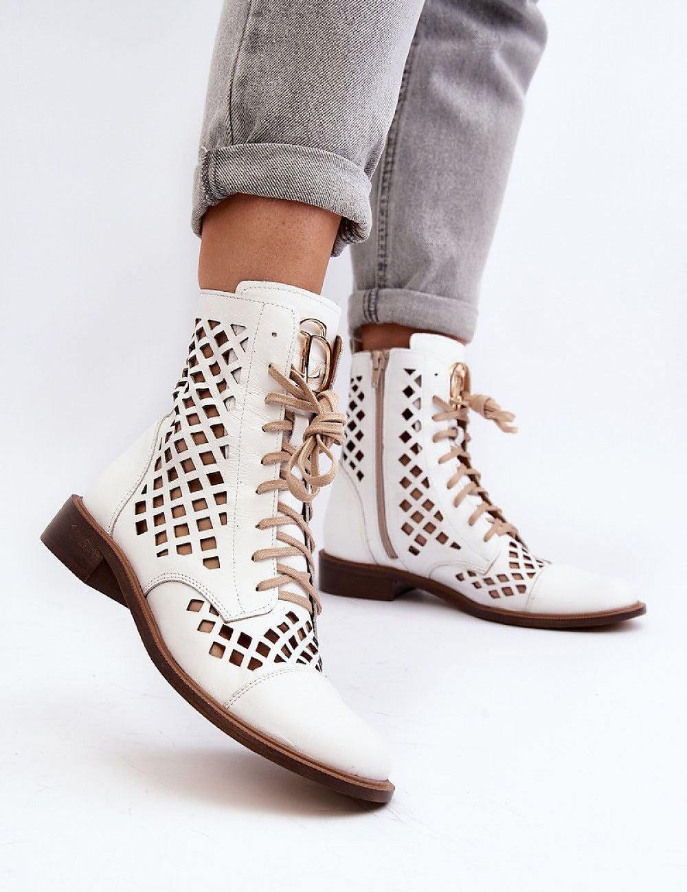 Solvitta perforated leather boots with lace-up and zipper, showcasing elegance and comfort in natural leather, perfect for seasonal wear.