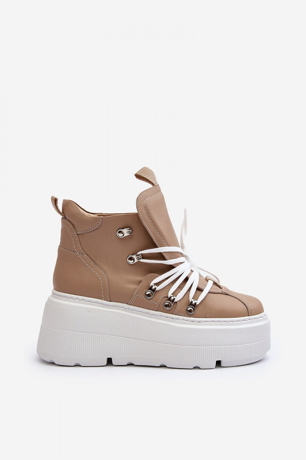 Side view of Ermelle Sculpted Platform Sneakers in tan leather, featuring a bold white sole and lace-up style for modern spring outfits.