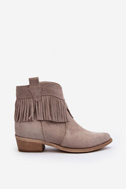 Tassava suede boots with tassel accent, featuring pointed toe and side zipper, ideal for enhancing spring outfits with skirts or jeans.