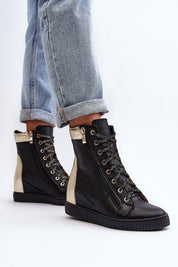 Revina Hidden Wedge Leather Sneakers with zippers and laces, modern design, shown with rolled-up jeans, ideal for spring fashion.