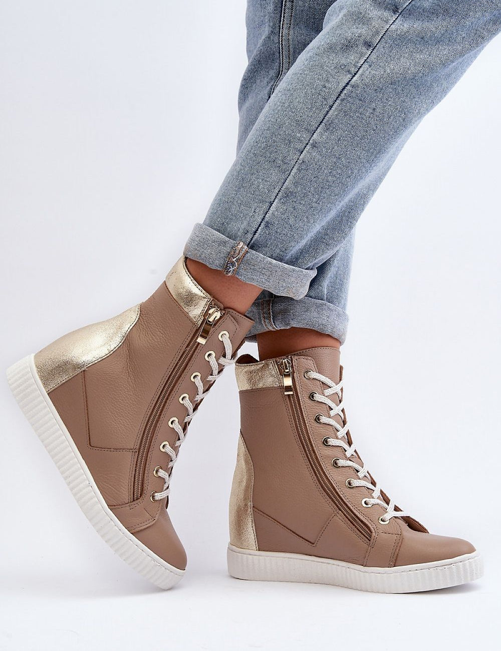 Revina Hidden Wedge Leather Sneakers with zippers and laces, modern beige design, ankle-high, worn with rolled jeans, side view close-up