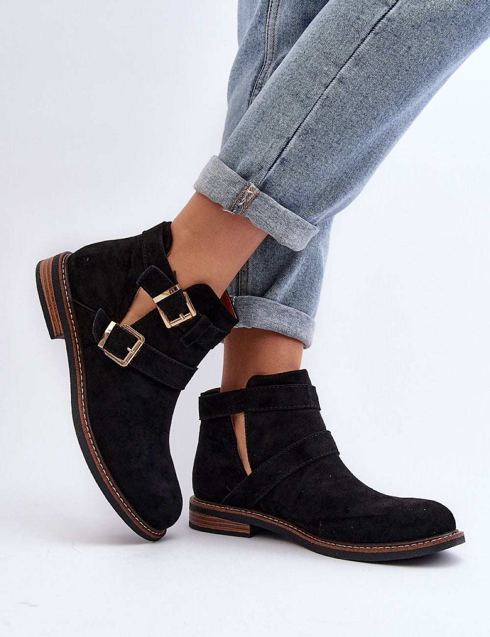 Velonna suede buckled spring boots with decorative ankle straps, perfect for denim pairing, featuring a rounded toe and flat heel.