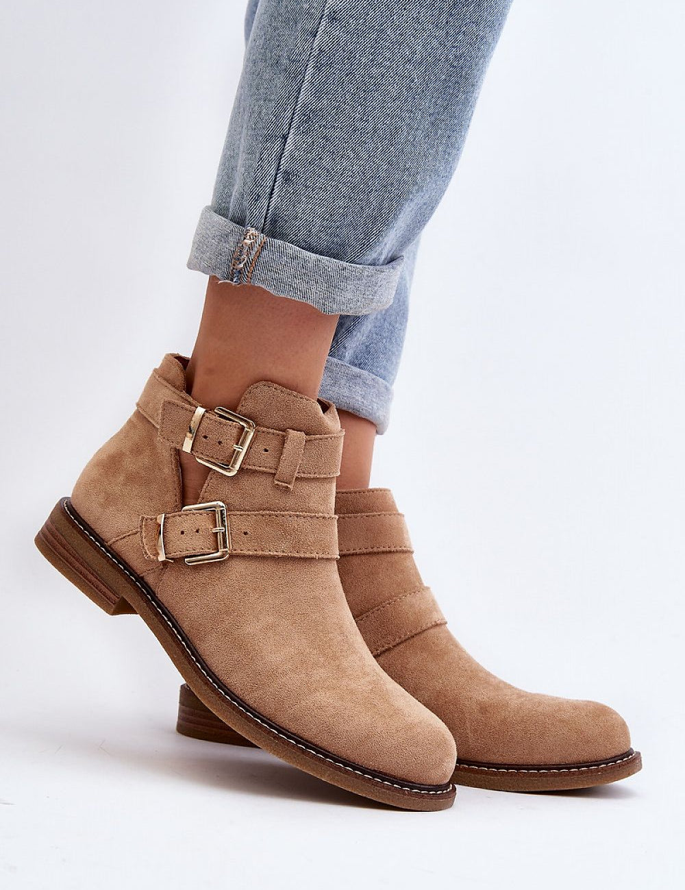Velonna Suede Buckled Spring Boots with ankle straps and flat heel, perfect for pairing with denim. Made from eco-suede for comfort.