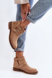 Velonna suede buckled spring boots with ankle straps, eco-suede material, flat heel, shown on model wearing denim jeans.