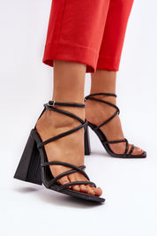 Eliore high heel buckled sandals with wide post heel and adjustable ankle strap made from eco leather for elevated comfort.