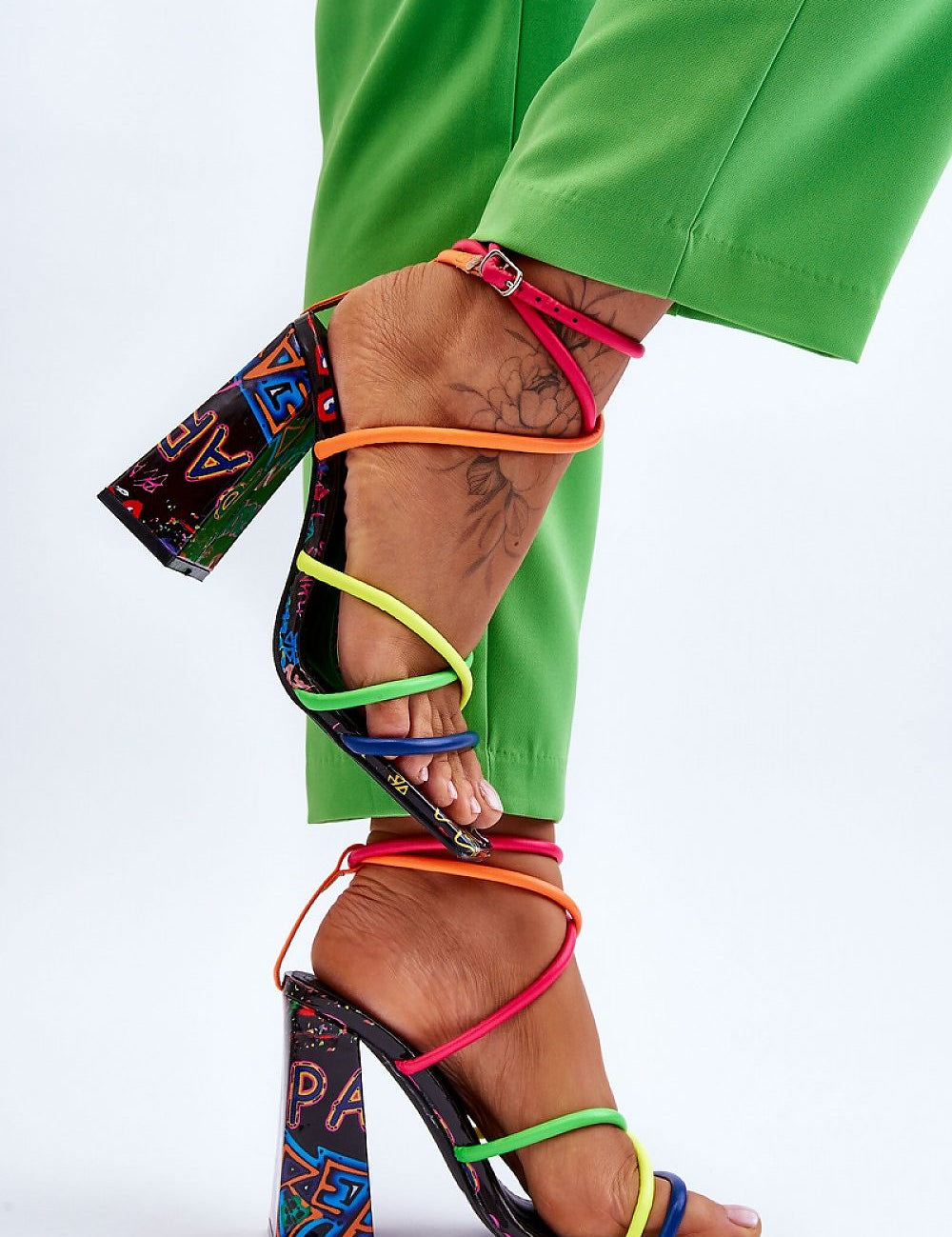 Colorful high heel sandals with buckle strap and wide post heel.
