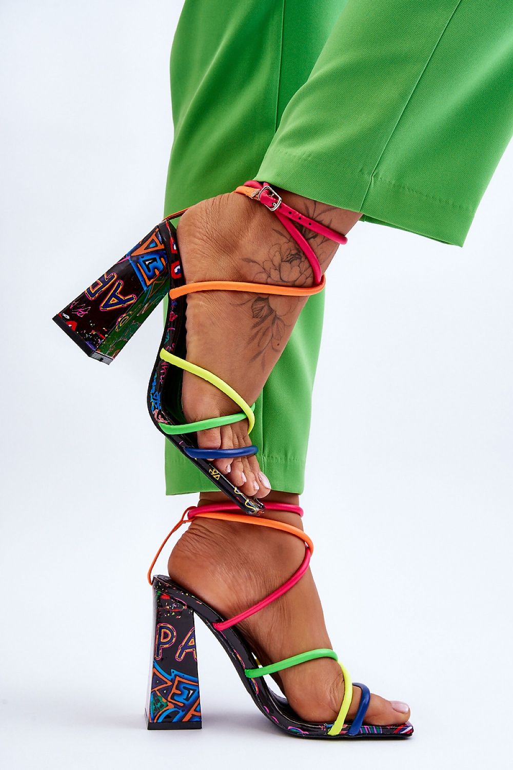 Colorful high heel sandals with buckle strap and wide post heel.