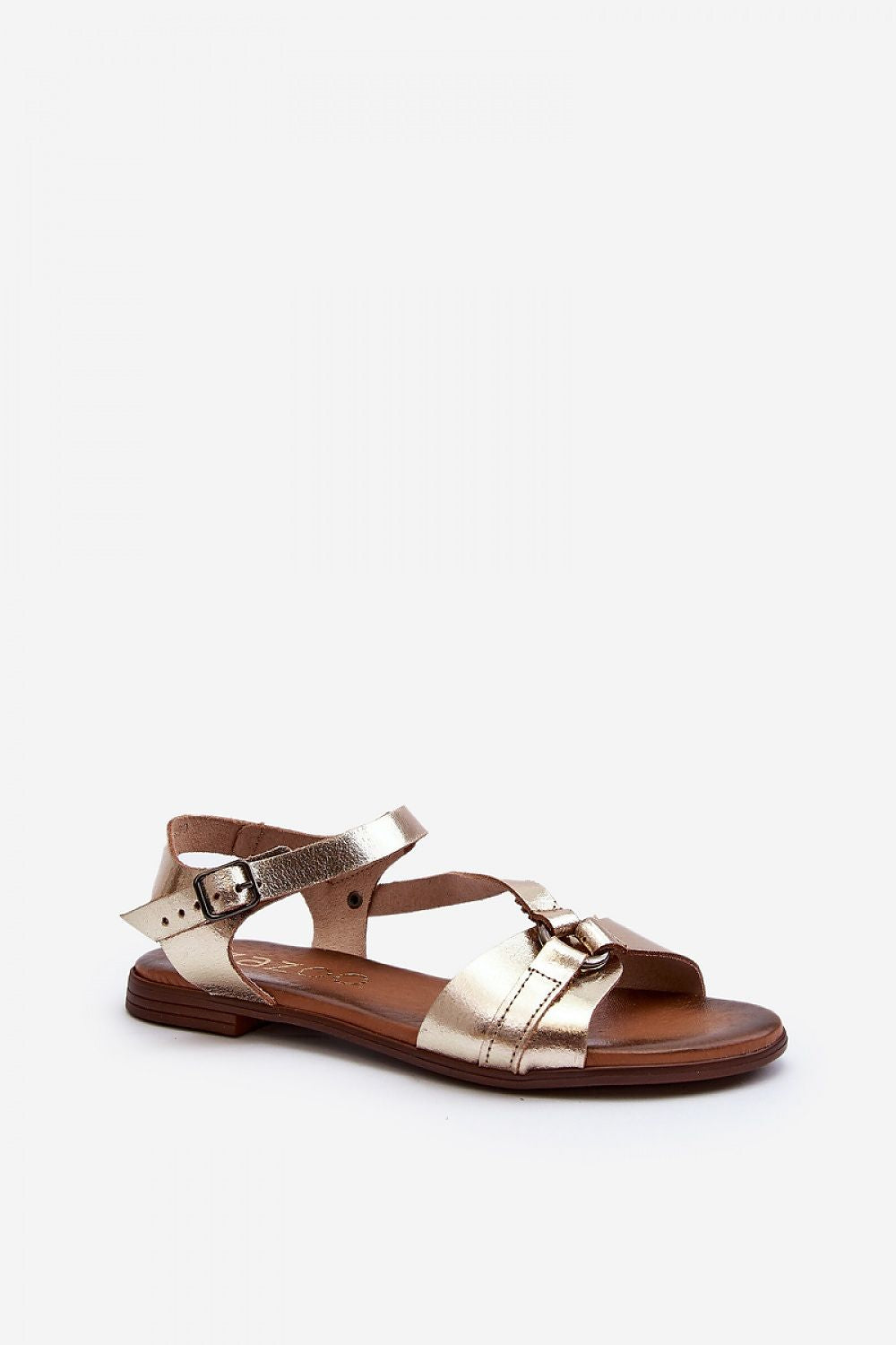 Sylvara Classic Leather Flat Sandals in natural leather with adjustable buckle strap, designed for comfort and summer wear.