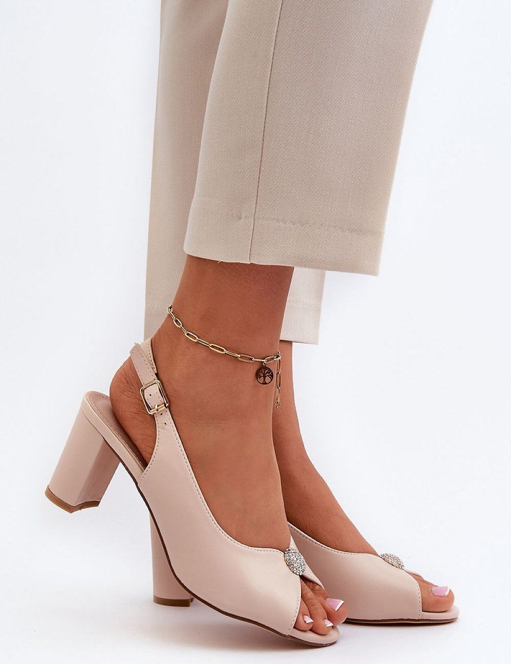 Nivaria Ornamented Heel Strap Sandals in eco leather, featuring a decorative accent, adjustable strap, and structured heel for elegance.