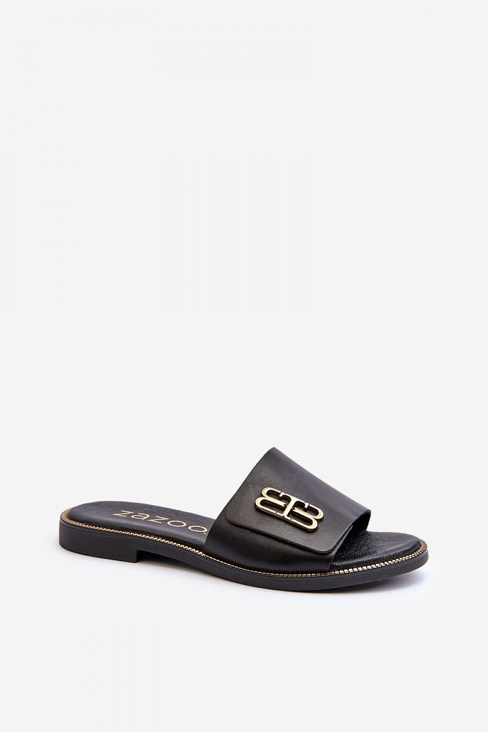 Tavirelle gold trim leather slide, featuring a sleek black design with a low-profile heel and elegant gold accent.