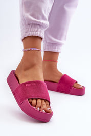 Zanurea Suede Platform Slide Sandals in pink, featuring a wide suede strap, solid platform base, and casual ease design.