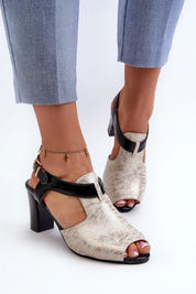 Esmira Post Heel Strap Sandals in eco leather with adjustable buckle, showcasing minimalist design and cushioned insole for comfort.