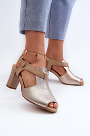 Esmira Post Heel Strap Sandals in metallic finish with adjustable buckle, featuring cushioned insole and eco leather construction.