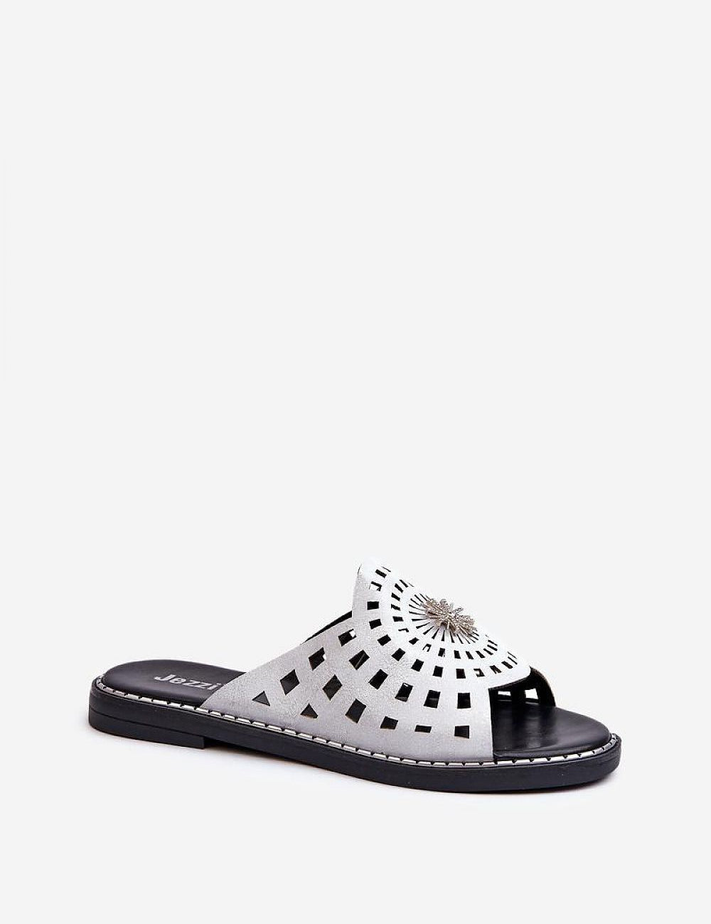 Orletta flat slides with cutout details in eco leather, offering breathability and style with a decorative front accent for warm days.