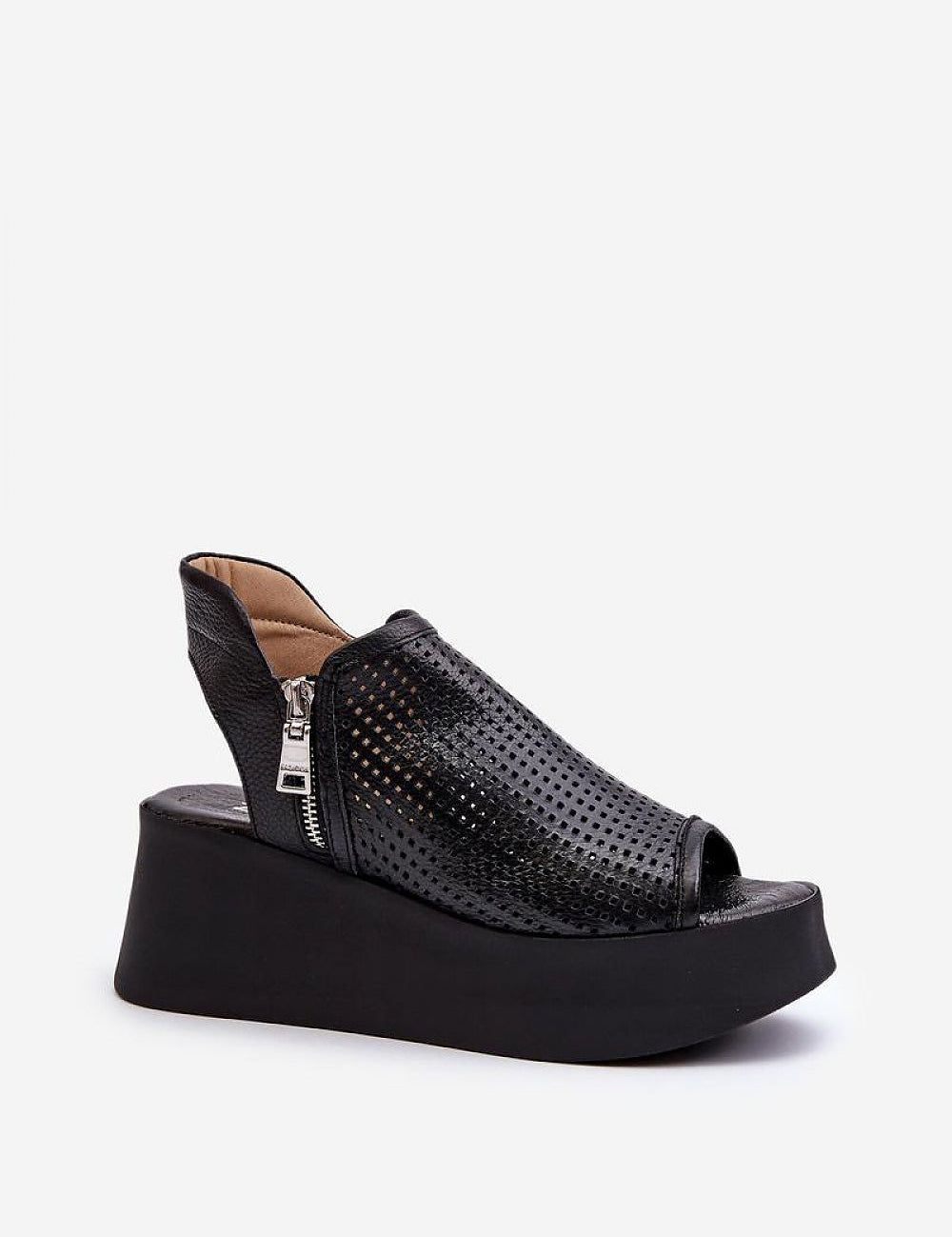 Openwork leather platform sandals with high heel and zipper closure, featuring a bold silhouette and airy pattern for a stylish look.