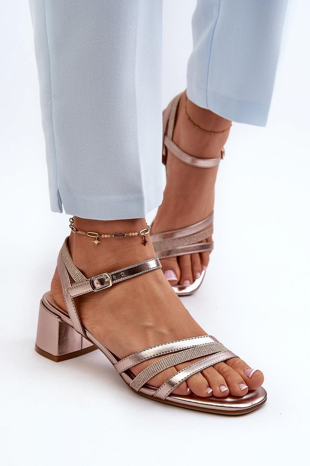 Sylviane Triple Strap Heel Sandals with adjustable ankle strap and eco leather, low block heel design for elegant summer style.