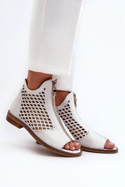 Almeryn Zipped Openwork Flat Sandals in white leather with front zipper, intricate openwork design, and embedded zircons for summer elegance.