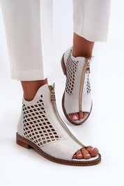 Almeryn Zipped Openwork Flat Sandals in white leather with front zipper and openwork design, featuring soft sole and subtle zircon detail.