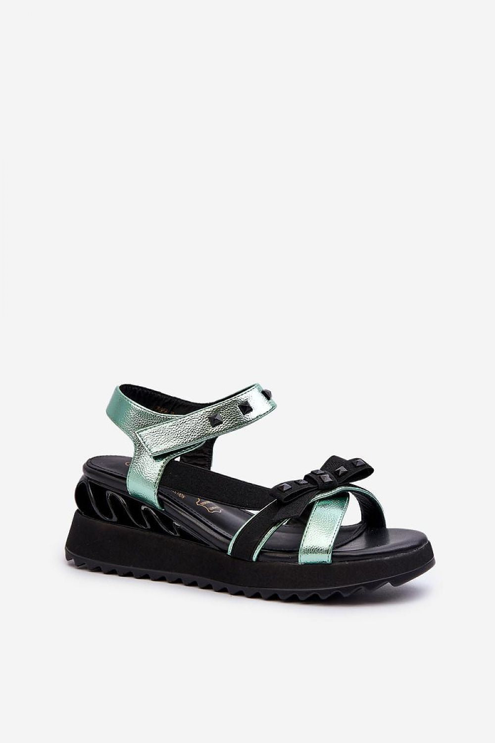 Aurelline Strap Bow Wedge Sandals with green artificial leather upper, black wedge heel, and bow detail, featuring Velcro closure.