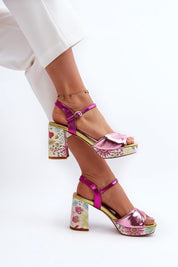 Florvella Patterned Block Heel Sandals with floral design, artificial leather upper, pink strap, and stable block heel, worn by model.
