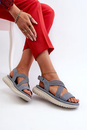 Eravelle Motion Grip Sandals in gray with eco leather upper and stretchable straps providing comfort and style.