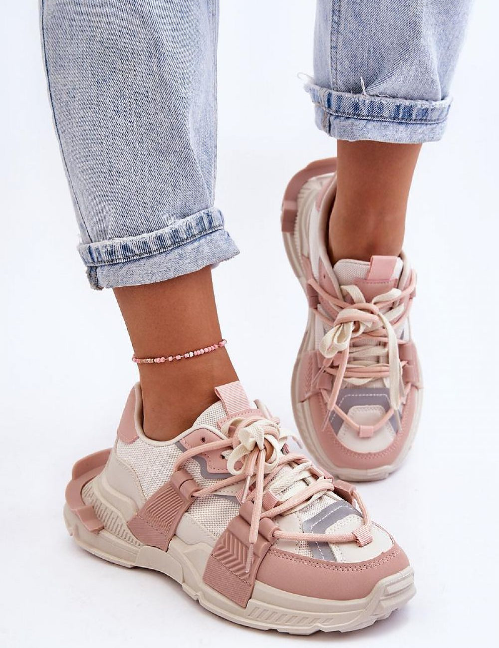 Ravetta Urban Platform Sneakers in pink and beige, featuring eco leather and textile materials, styled with cuffed jeans for a casual look.