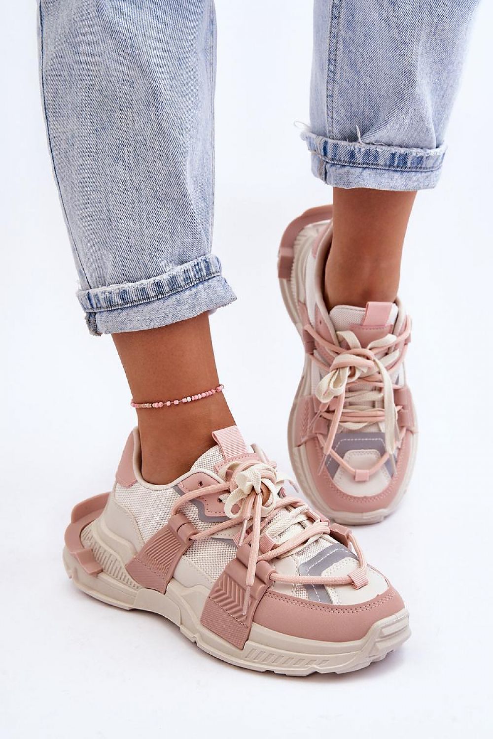 Ravetta Urban Platform Sneakers in pink and beige, featuring eco leather and textile materials, styled with cuffed jeans for a casual look.