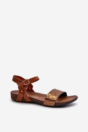 Sorellia buckled leather sandals with adjustable ankle strap, featuring a brown and tan design for summer wear.