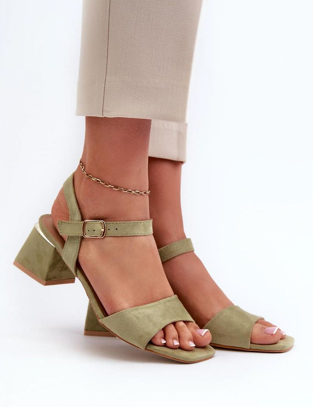 Woman wearing Valenta eco suede block-heel sandals with ankle strap, perfect for stylish summer outfits.