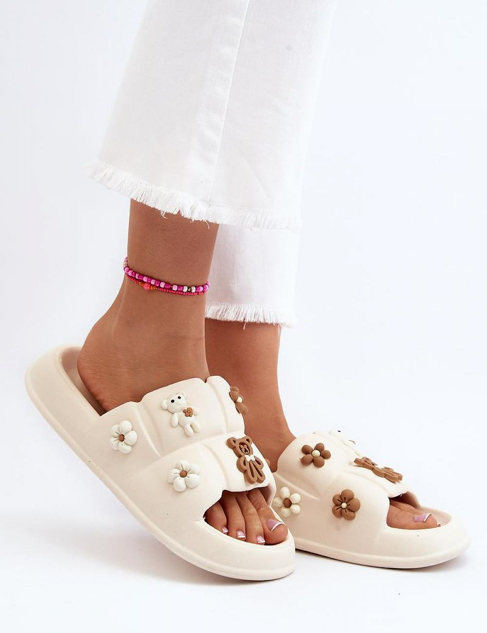 Valessa Foam Platform Summer Slides with broad strap, whimsical floral accents, lightweight comfort, and sculpted sole for stability.