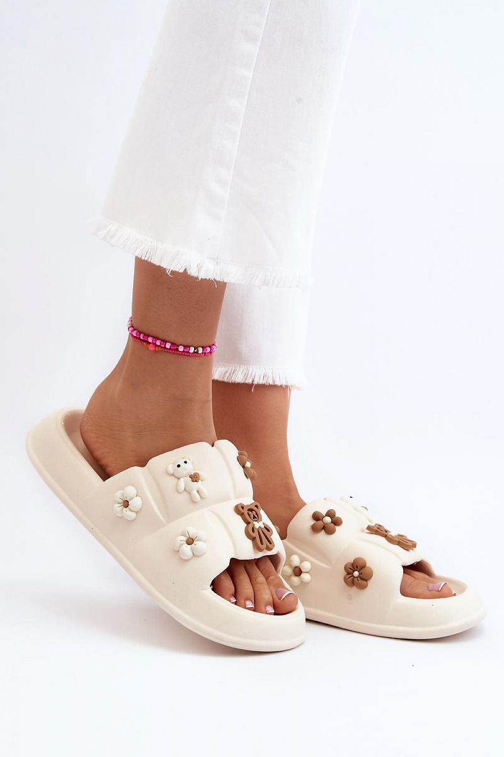 Valessa Foam Platform Summer Slides with broad strap, whimsical floral accents, lightweight comfort, and sculpted sole for stability.