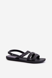 Black Arvia Buckled Poolside Sandals with adjustable buckle straps and lightweight rubber construction for summer wear.