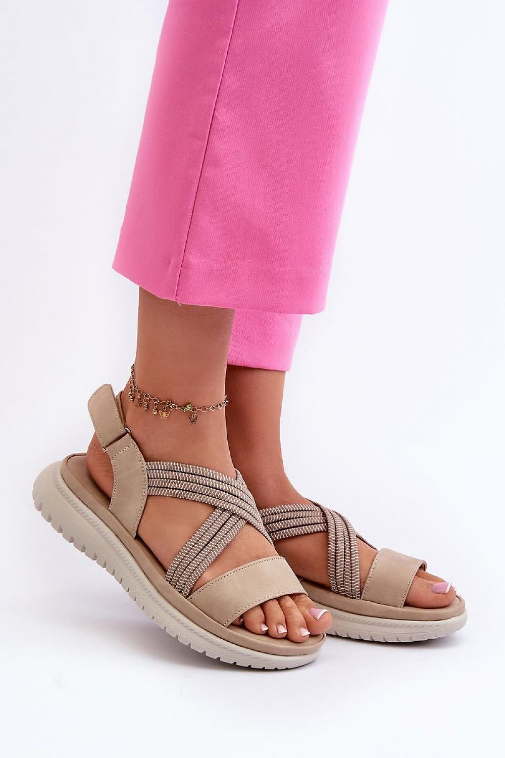 Stylish Rovanna Trek Strap Sandals with supportive sole and elastic cross-straps, perfect for active summer days and casual outfits.