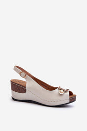 Vesmira Lifted Comfort Wedges with eco leather straps and cushioned suede insole, adjustable buckle strap for a perfect fit.