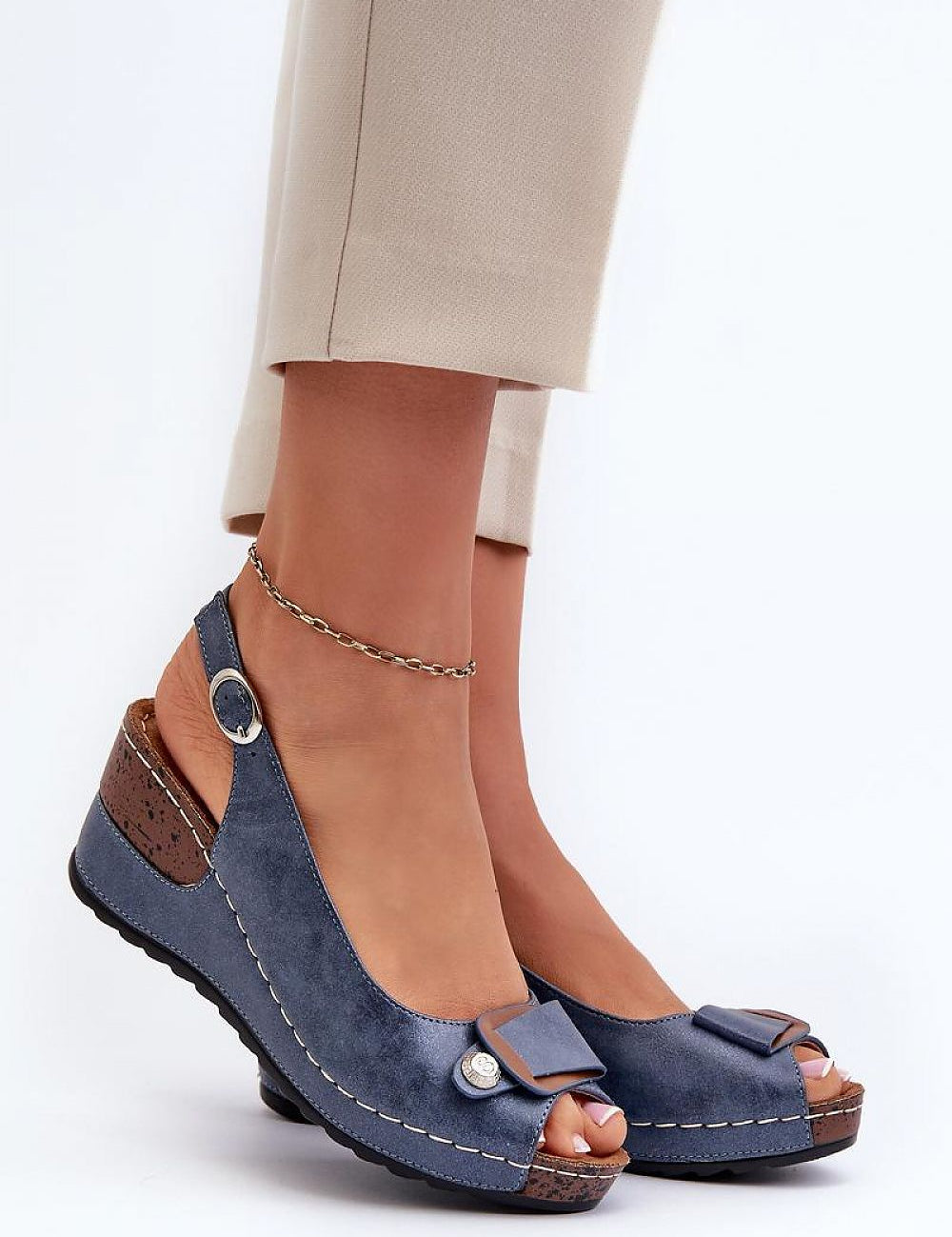 Blue Vesmira Lifted Comfort Wedges with eco leather straps and cushioned suede insole for height and ease, adjustable buckle strap.