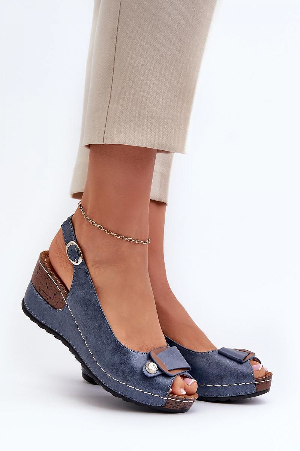 Blue Vesmira Lifted Comfort Wedges with eco leather straps and cushioned suede insole for height and ease, adjustable buckle strap.
