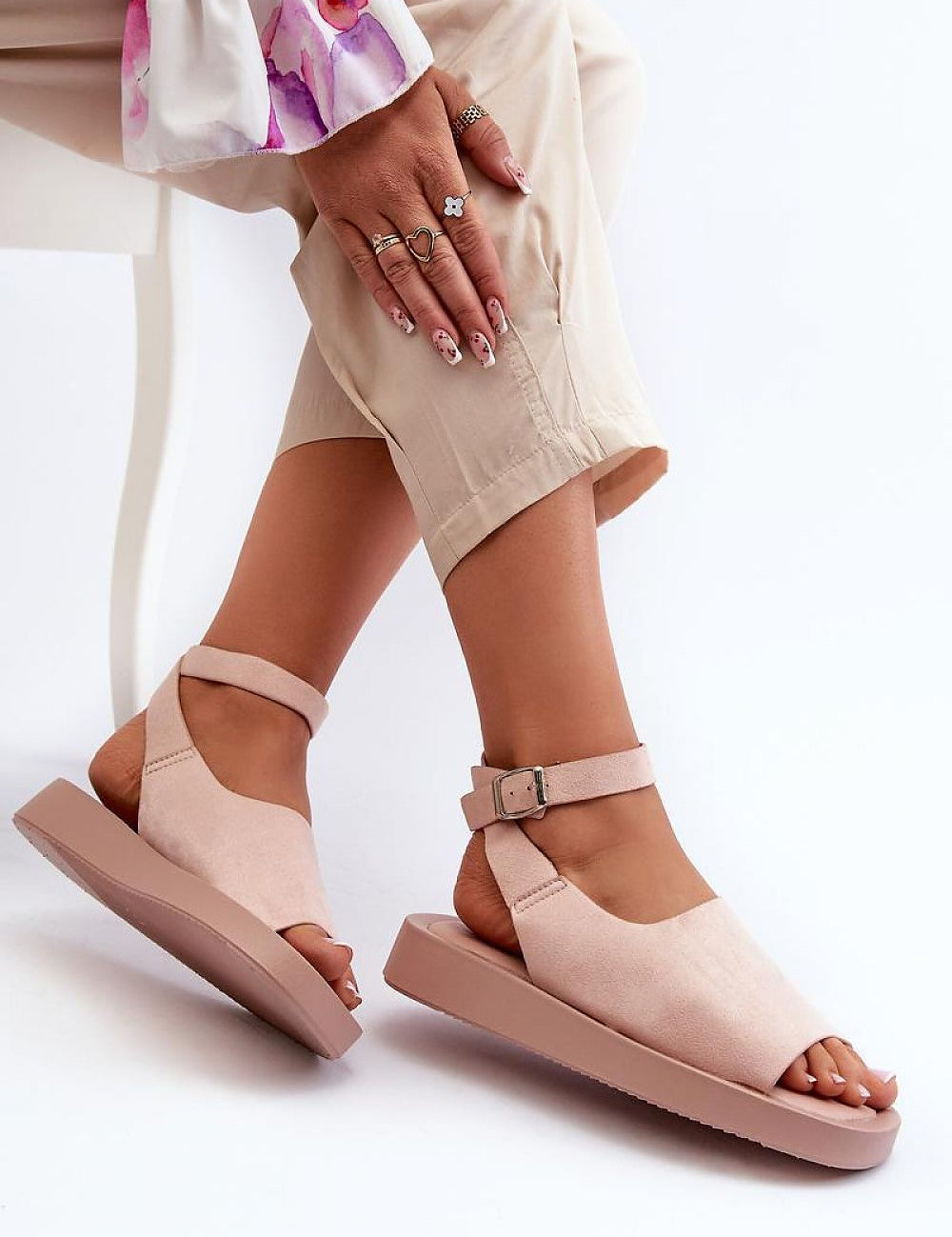 Model wearing Nirella Suede Platform Sandals with eco-suede upper and adjustable ankle strap for added style and comfort.