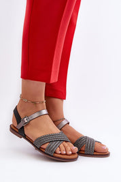 Serelvia Minimal Strap Sandals in eco leather with adjustable buckle, shown on model wearing red pants, showcasing sleek design.