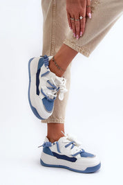 Velenta Modern Platform Sneakers in blue and white, styled with beige pants, showcasing comfort and fashion-forward design.