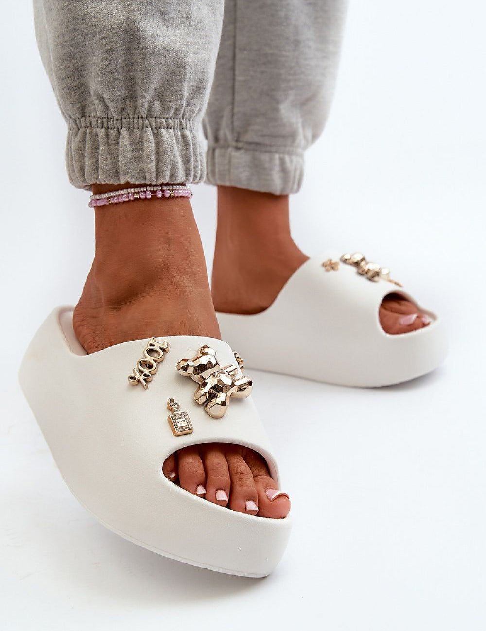 Floriva Thick-Sole Foam Flip-Flops with decorative accents, featuring a 5.5 cm platform, perfect for summer outings and casual style.