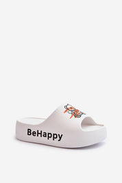 White foam flip-flop with "BeHappy" text and teddy bear print, offering lightweight comfort for summer days and casual outings.