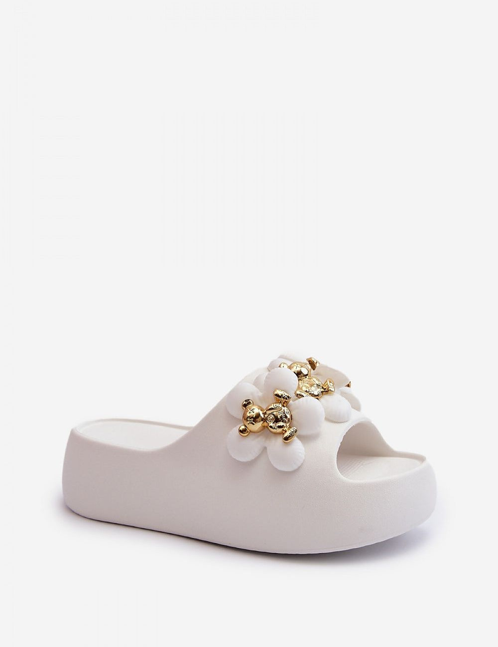 White platform flip-flop with decorative embellishments and thick sole, ideal for casual summer wear and beach outings.