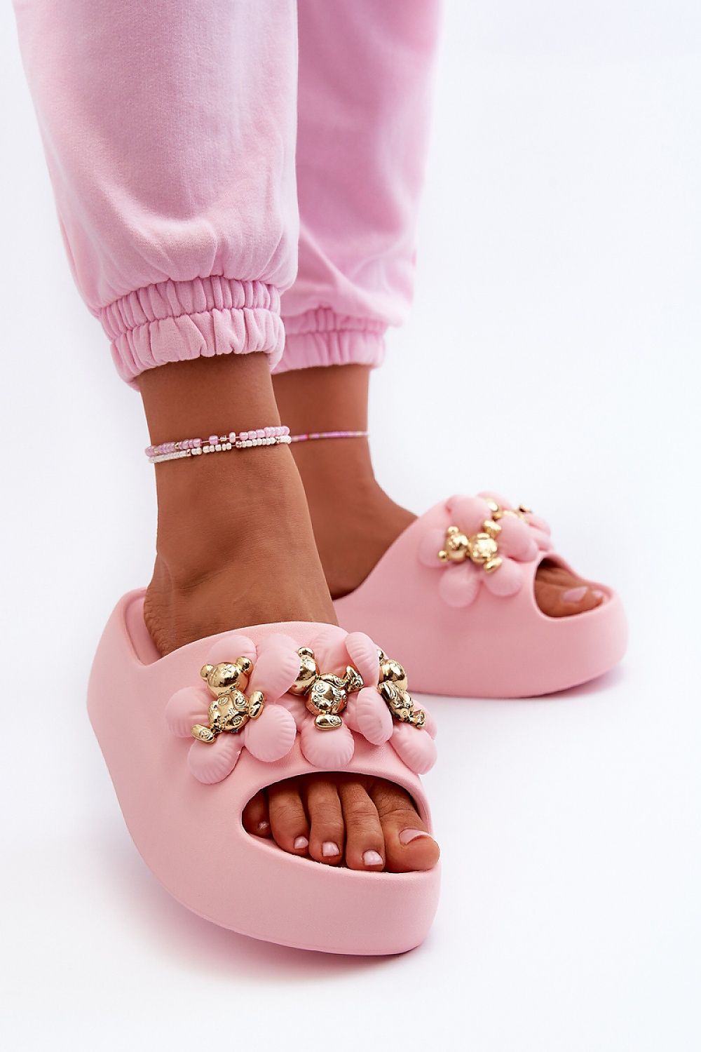 Person wearing Kensura Platform Summer Flip-Flops with pink thick platform sole and decorative accents, showcasing playful summer style.