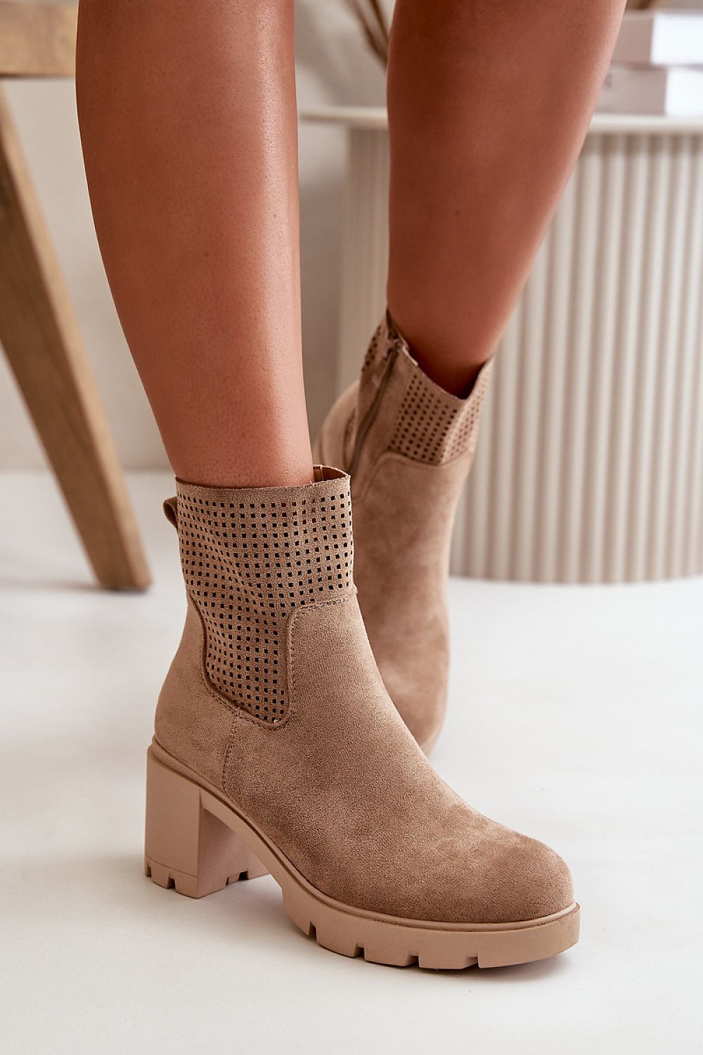 Eco suede ankle boots with block heel and side zipper, offering comfort and style for versatile autumn and winter fashion.