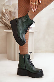 Tharvene Ridgewarm Sculpted Ease buskin-style ankle boots, green leather, high wedge with grooved platform, side zipper, decorative details.
