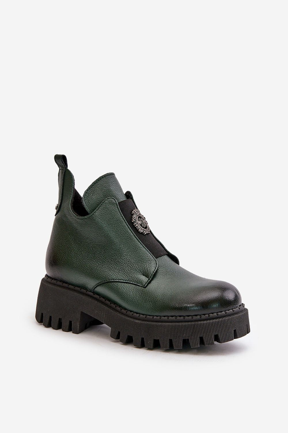 Virelsa Cresthold Leather Form ankle boot with chunky heel, grooved platform, and decorative front embellishment in green leather.